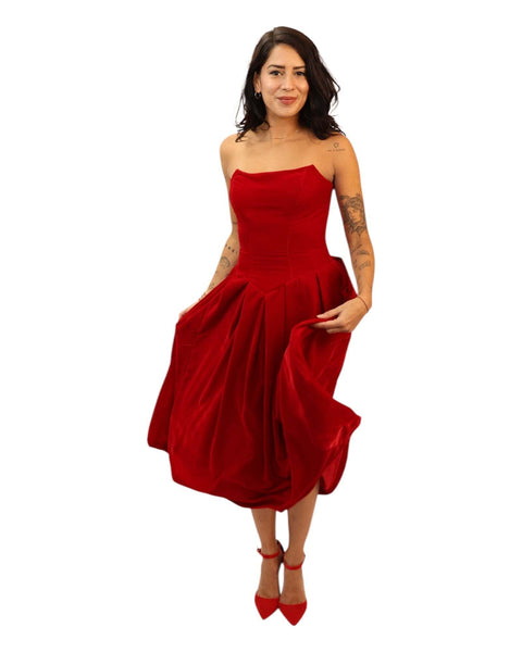 Rose Velvet dress in red with corset and voluminous skirt, perfect for special occasions.