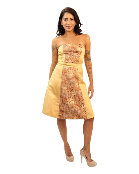 Victoria Gold Midi Print Dress with A-line silhouette and elegant pattern.